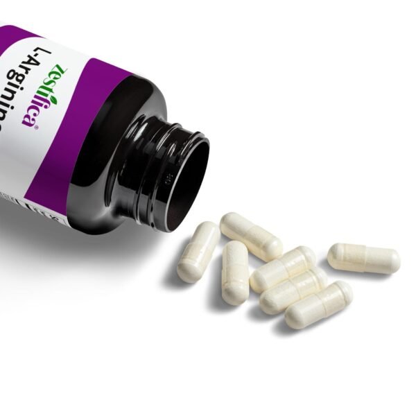 Capsules spilled out of Zestifica L-Arginine Supplement (60 Capsules) supplement
