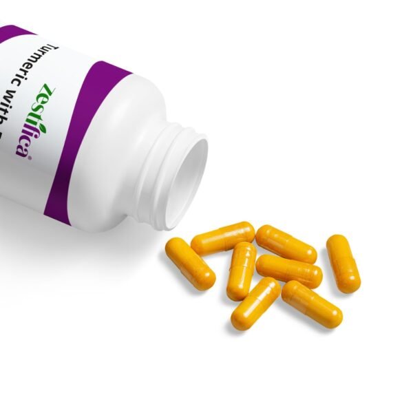 Capsules spilled out of Zestifica Turmeric with BioPerine® Supplement (60 Capsules) supplement